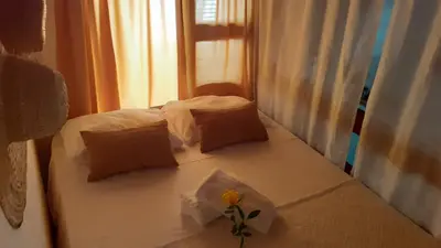Uma cama ou camas num quarto em Casa Yume Jericoacoara