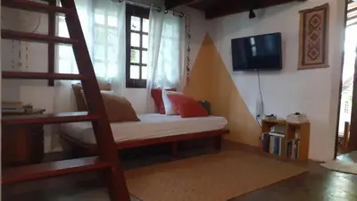 Uma televisão e/ou sistema de entretenimento em Casa Yume Jericoacoara