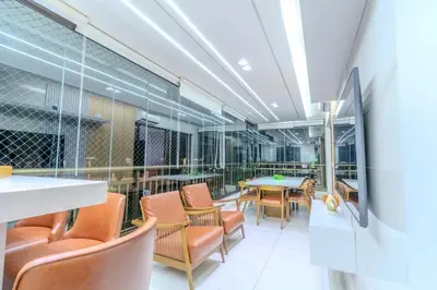 Uma área de estar em Mandara Lanai Apartamento Bangalô