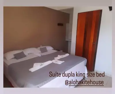 Uma cama ou camas num quarto em Aloha Kite House