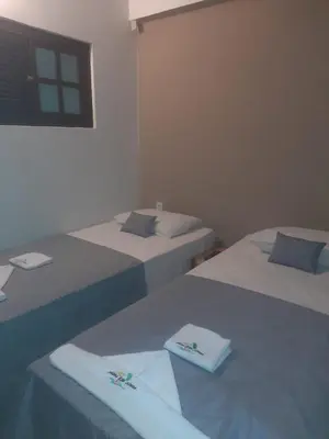 Uma cama ou camas num quarto em Aloha Kite House