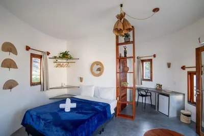 Uma cama ou camas num quarto em VentoVinte Beach Club