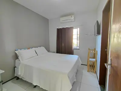 Uma cama ou camas num quarto em Panorama Cumbuco