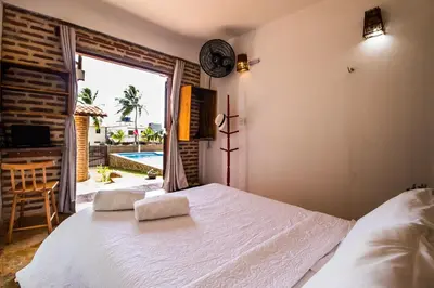 Uma cama ou camas num quarto em Pico dos Piratas