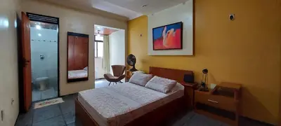 Uma cama ou camas num quarto em Fortaleza Flat Executivo