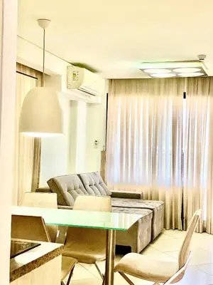 Uma área de estar em Landscape Beira Mar Deluxe Vista Mar