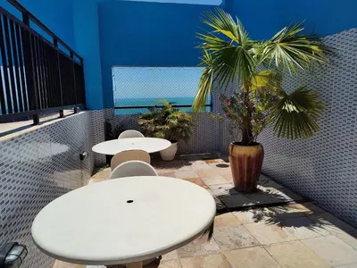 Uma área de estar em Flat Vista sensacional 4 pessoas