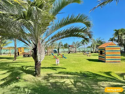 Um jardim no exterior de Resort VG SUN por Be My Guest!