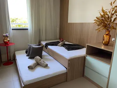 Uma cama ou camas num quarto em Apto. Beach Way, 400M Beach Park - Beira Mar - 2 Dormitórios