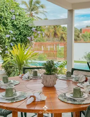 Um jardim no exterior de Let Village