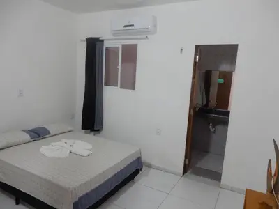 Uma cama ou camas num quarto em Pousada Ah Mar