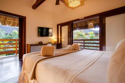 Uma cama ou camas num quarto em Villa Messina Jeri
