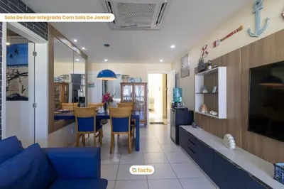 Uma televisão e/ou sistema de entretenimento em Bangalô frente-mar no VG Sun para 6