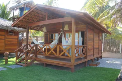 Um jardim no exterior de Pousada Wind Rose