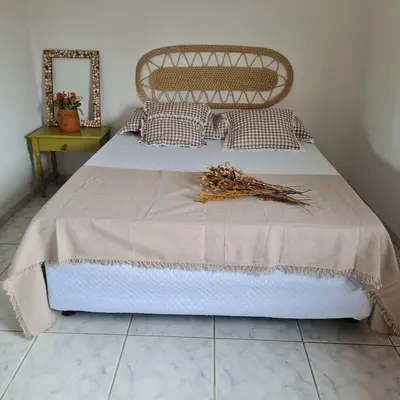 Uma cama ou camas num quarto em Casa do Bougainvillea Mundaú-Trairi-Ce
