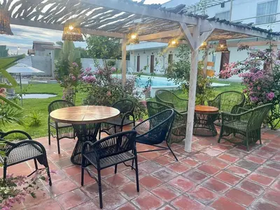 Um jardim no exterior de Pousada Mali