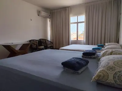 Uma cama ou camas num quarto em Maravilhoso Apartamento. Vista p/ Praia do Futuro