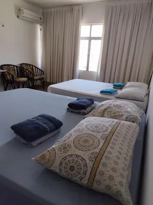 Uma cama ou camas num quarto em Maravilhoso Apartamento. Vista p/ Praia do Futuro