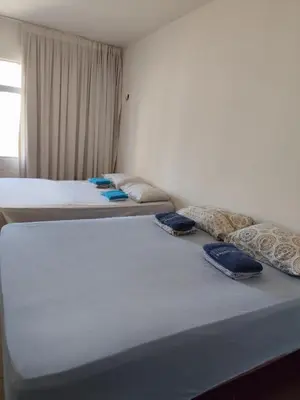 Uma cama ou camas num quarto em Maravilhoso Apartamento. Vista p/ Praia do Futuro