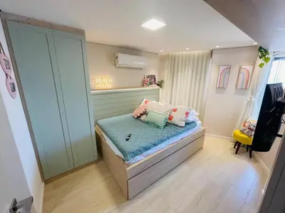 Uma cama ou camas num quarto em Flat Luxuoso Alto Padrao Frente Mar com 2 suites no Iate Plaza