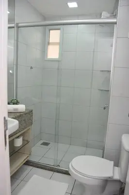 Uma casa de banho em TERRAMARIS DUPLEX LUXO - FRENTE MAR