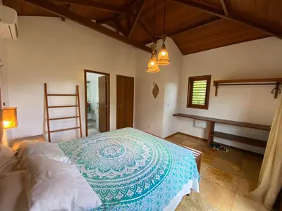 Uma cama ou camas num quarto em Condominio Vila dos Ventos
