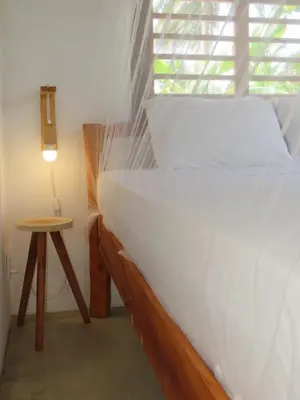 Uma cama ou camas num quarto em Pitico - Icaraí Kite Village