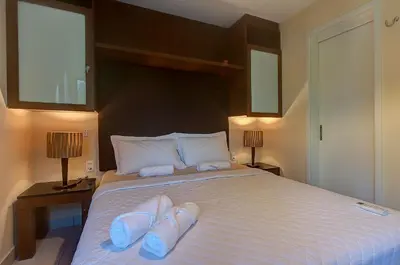 Uma cama ou camas num quarto em VG Sun #102 - Apto de Dois Quartos por Carpediem