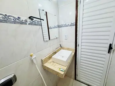 Uma casa de banho em Ap próximo ao Arco com garagem
