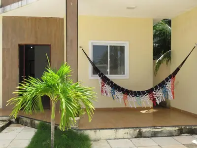 Um jardim no exterior de Casa Mar e Dunas