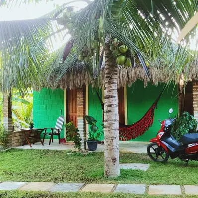 Um jardim no exterior de Vila Coqueiro - Moitas