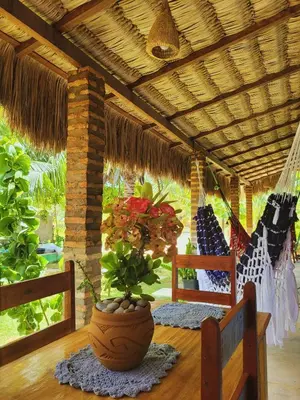 Um jardim no exterior de Vila Coqueiro - Moitas