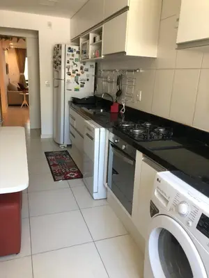 A cozinha ou kitchenette de Apto de luxo no Golfville Ideal para família e home office Prox do Beach Park