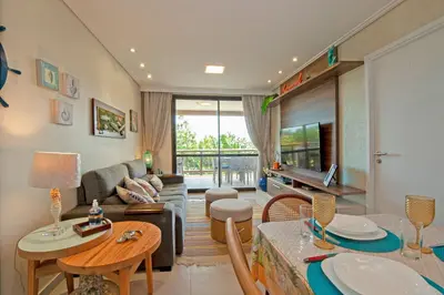 Uma área de estar em WaiWai 306 - Apê C/ Varanda Vista Mar by Carpediem