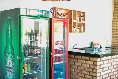 A área de bar ou lounge em Pousada Maanain