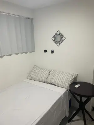 Uma cama ou camas num quarto em Beach Class Praia de Iracema