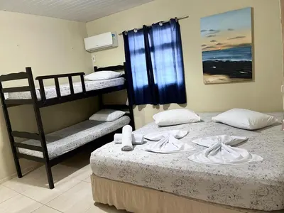 Uma cama ou camas num quarto em Casa Brisa Mar