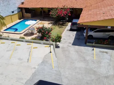 A piscina em ou perto de Apartamento 06 - na Praia do Futuro com piscina.