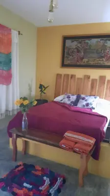 Uma cama ou camas num quarto em Sítio Vale da Serra