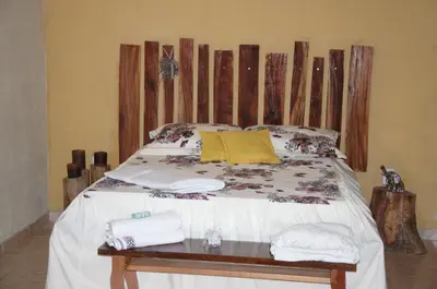 Uma cama ou camas num quarto em Sítio Vale da Serra