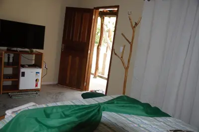 Uma cama ou camas num quarto em Sítio Vale da Serra