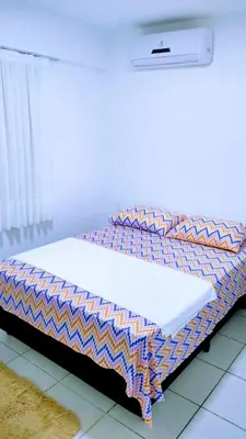 Uma cama ou camas num quarto em Apartamento em Fortaleza, Abolição Mucuripe