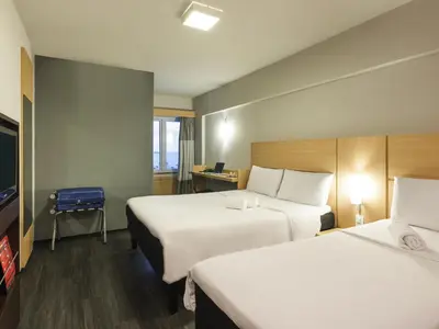 Uma cama ou camas num quarto em ibis Fortaleza Praia de Iracema