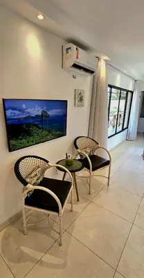 Uma área de estar em Peco Paradise Cumbuco Ap119