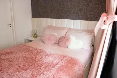 Uma cama ou camas num quarto em Apartamento com Varanda vista mar