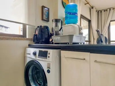 A cozinha ou kitchenette de Cumbuco Dream Village 602V by Aloha Vibes ADM