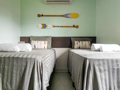 Uma cama ou camas num quarto em Cumbuco Dream Village 602V by Aloha Vibes ADM