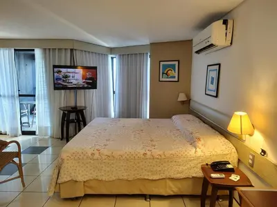Uma cama ou camas num quarto em Flat 1211 Luxo Beira Mar Fortaleza