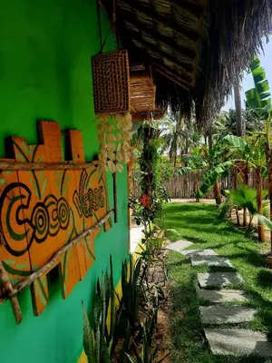 Um jardim no exterior de Côco Verde - Icaraí Kite Village