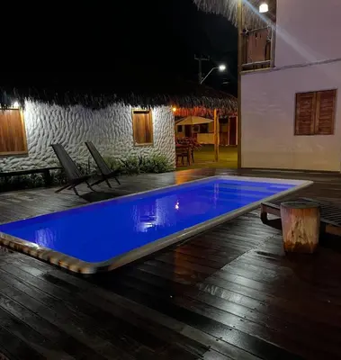A piscina em ou perto de Casa de praia em Fortim CE com ótima localização e fácil acesso